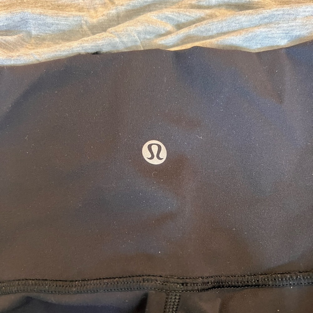 Lululemon black leggings size 4